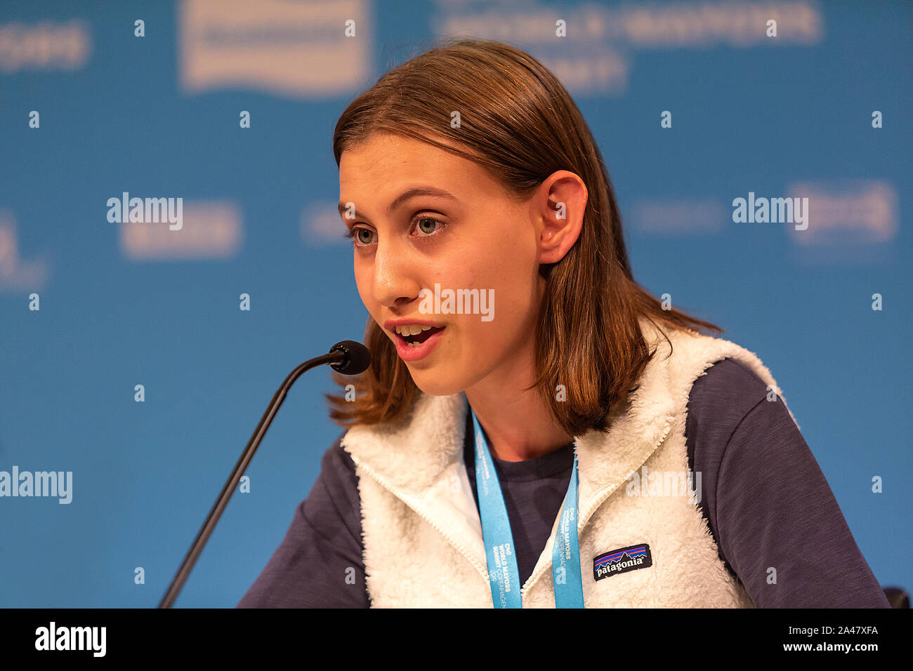 COPENHAGEN, DENMARK – OCTOBER 11, 2019:  Alexandria Villaseñor, climate activists within the ‘Fridays for Future’ movement, New York, USA, speaks at the ‘Mayors and Youth Activist’ press conference at the C40 World Mayors Summit.  During the press conference young activist explained what they expect of the grown-up politicians. More than 90 mayors of some of the world’s largest and most influential cities representing some 700 million people meet in Copenhagen from October 9-12 for the C40 World Mayors Summit. The purpose with the summit in Copenhagen is to build a global coalition of leading Stock Photo