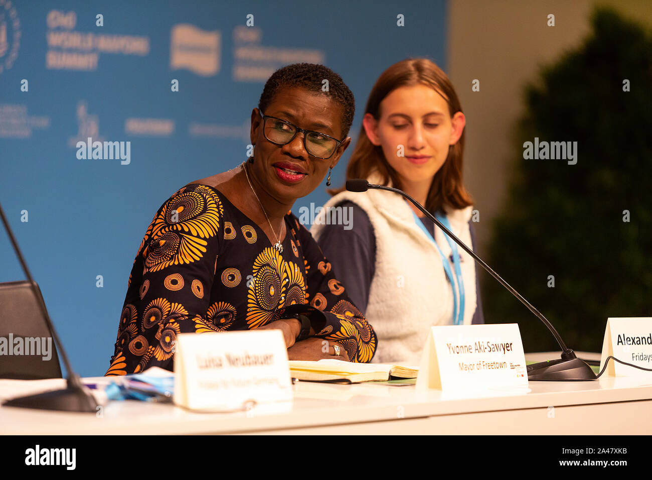 COPENHAGEN, DENMARK – OCTOBER 11, 2019: Yvonne Aki-Sawyer, Mayor of Freetown, Sierra Leone, during the ‘Mayors and Youth Activist’ press conference at the C40 World Mayors Summit. During the press conference young activist explained what they expect of the grown-up politicians. More than 90 mayors of some of the world’s largest and most influential cities representing some 700 million people meet in Copenhagen from October 9-12 for the C40 World Mayors Summit. The purpose with the summit in Copenhagen is to build a global coalition of leading cities, businesses and citizens that rallies around Stock Photo