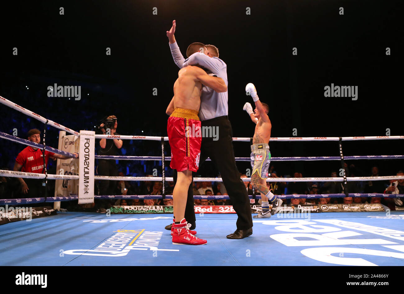 The referee ends the fight in the International Boxing Federation World Feather Title at First Direct Arena, Leeds. Stock Photo