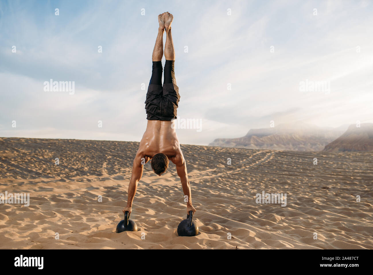 Strong man stands hands hi-res stock photography and images - Alamy