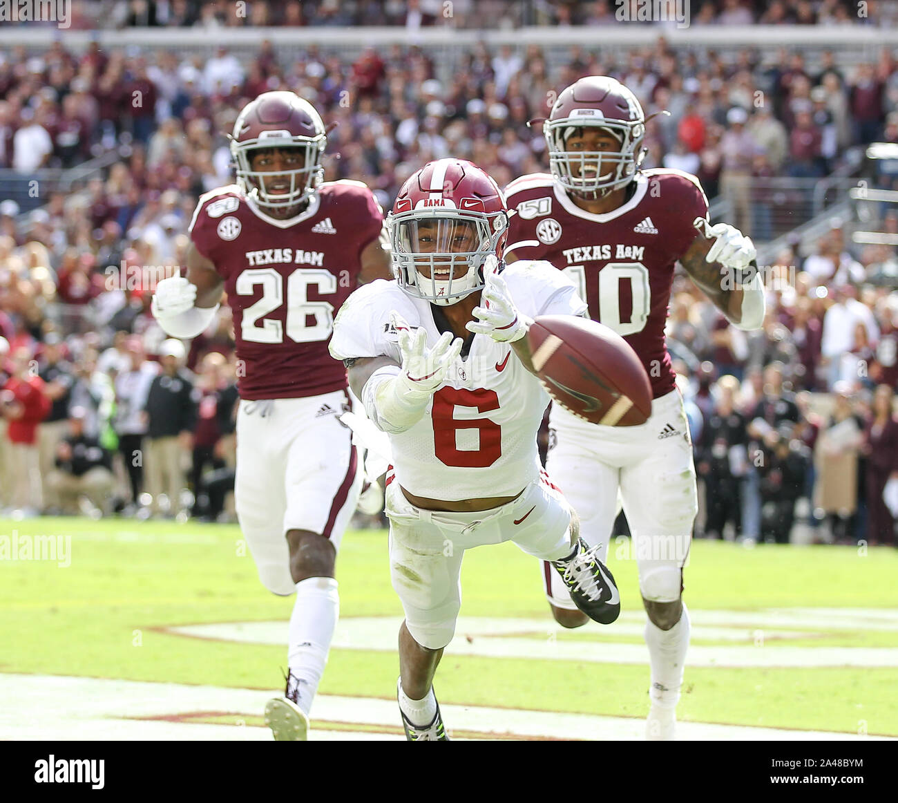College Station, Texas, USA. 12th Oct, 2019. Alabama Crimson Tide wide receiver DeVonta Smith (6) dives for an out of reach pass in the end zone during an NCAA football game between Texas A&M and Alabama at Kyle Field in College Station, Texas, on Oct. 12, 2019. Credit: Scott Coleman/ZUMA Wire/Alamy Live News Stock Photo