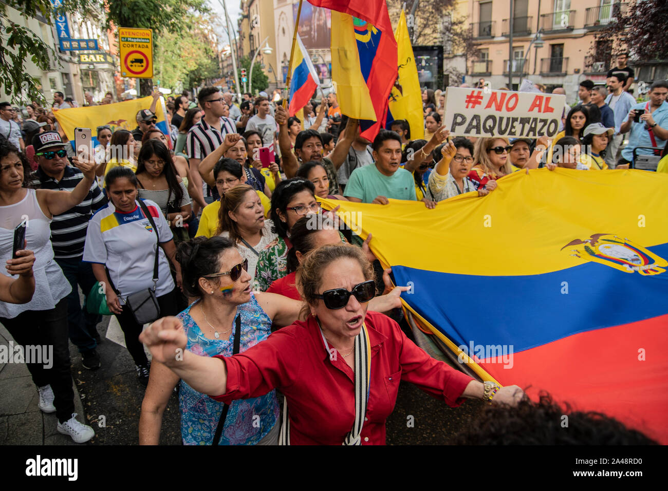 Several dozen Ecuadorian residents in Spain have agreed with this demonstration against the celebration of Hispanic Day a protest by the community of Stock Photo