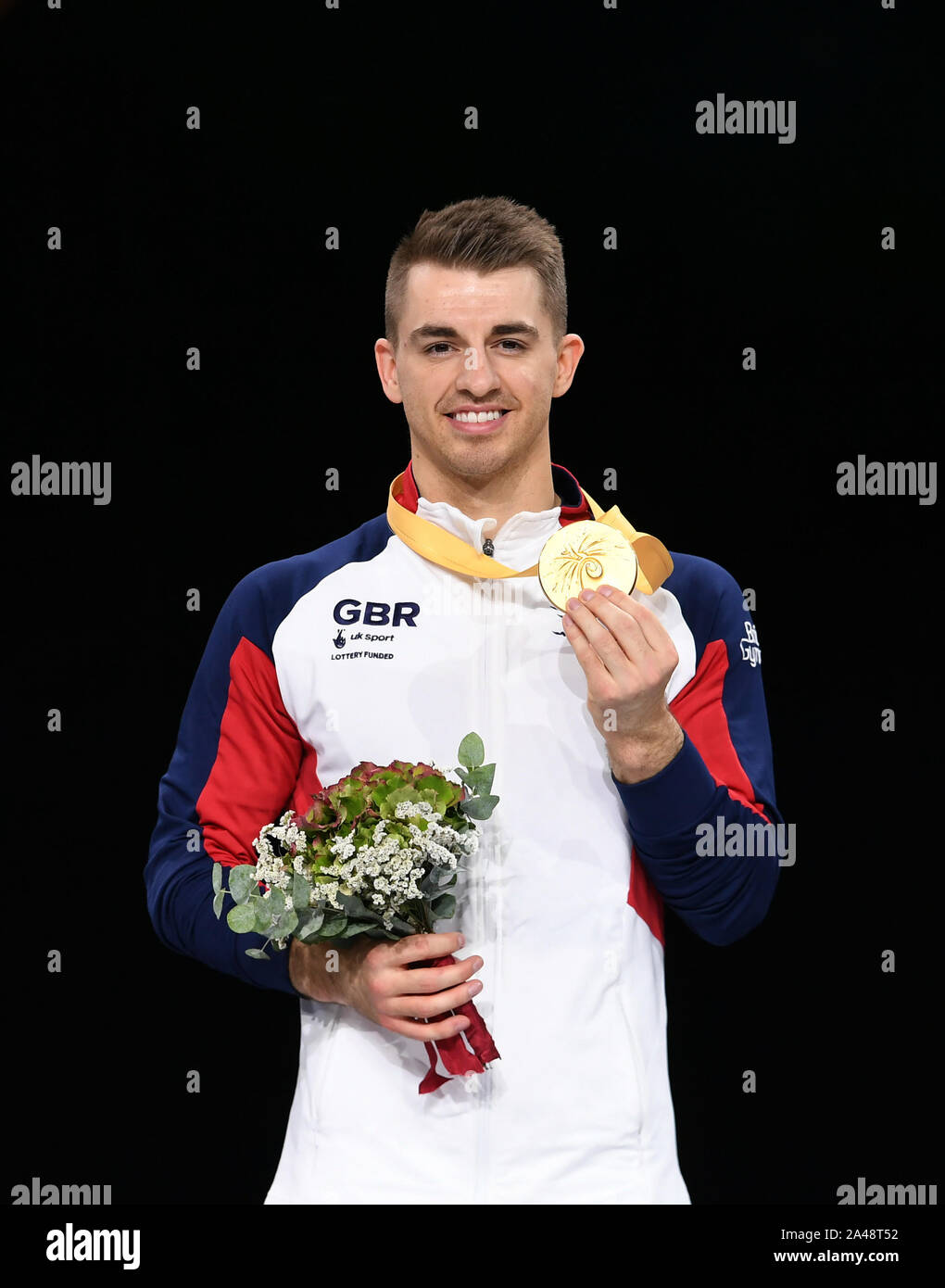 Stuttgart, Germany. 12th Oct, 2019. Max Whitlock of Great Britain holds