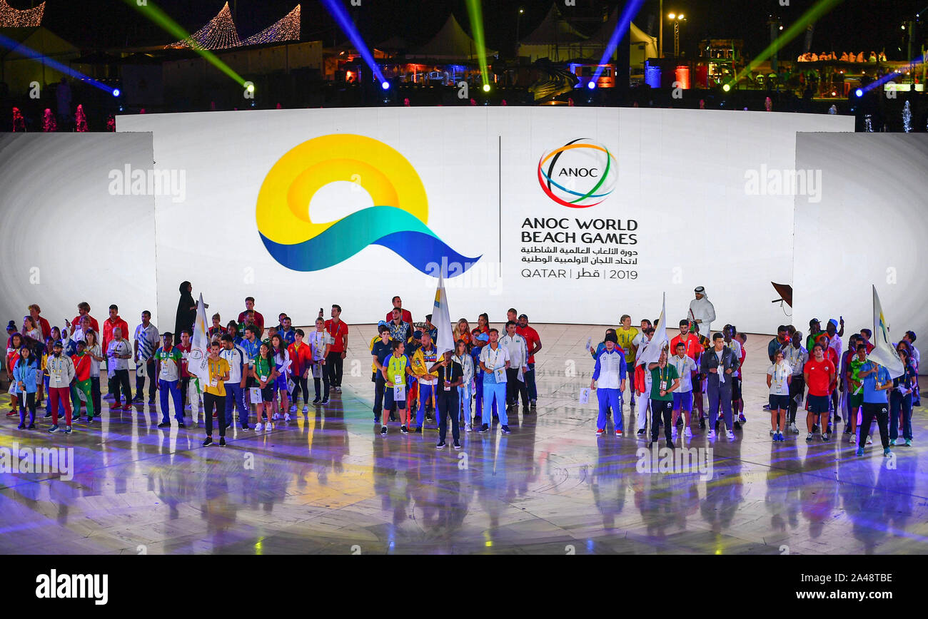 Doha, Qatar. 12th Oct, 2019. Athletes stand togather during the Opening Ceremony of the 1st ANOC World Beach Games in Doha, Qatar, Oct. 12, 2019. Credit: Nikku/Xinhua/Alamy Live News Stock Photo