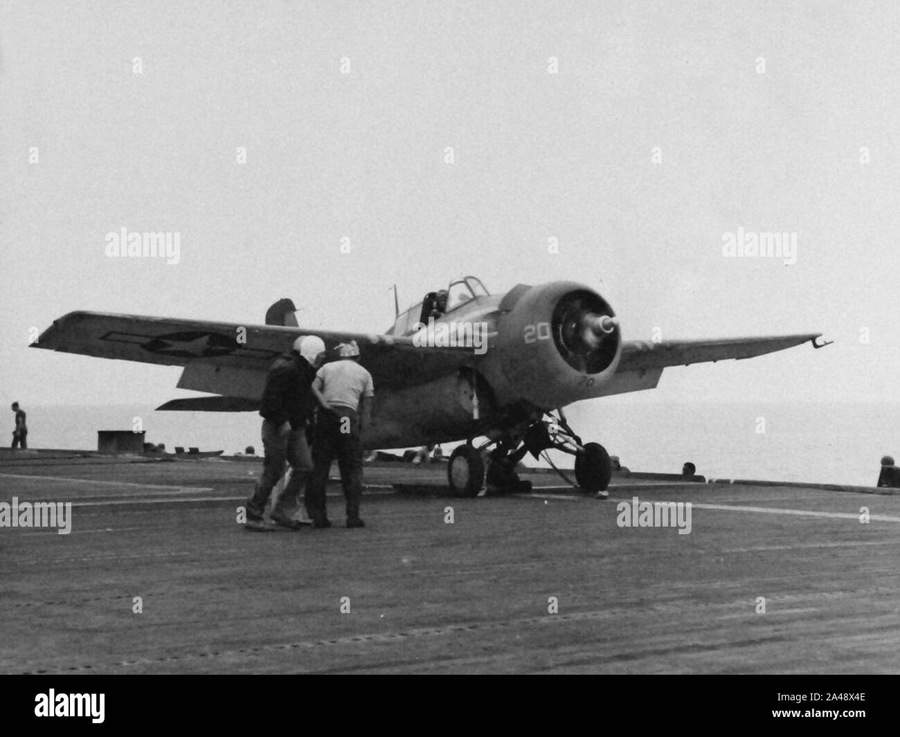 FM-2 Wildcat on catapult of USS Matanikau (CVE-101) on 27 July 1944 Stock Photo