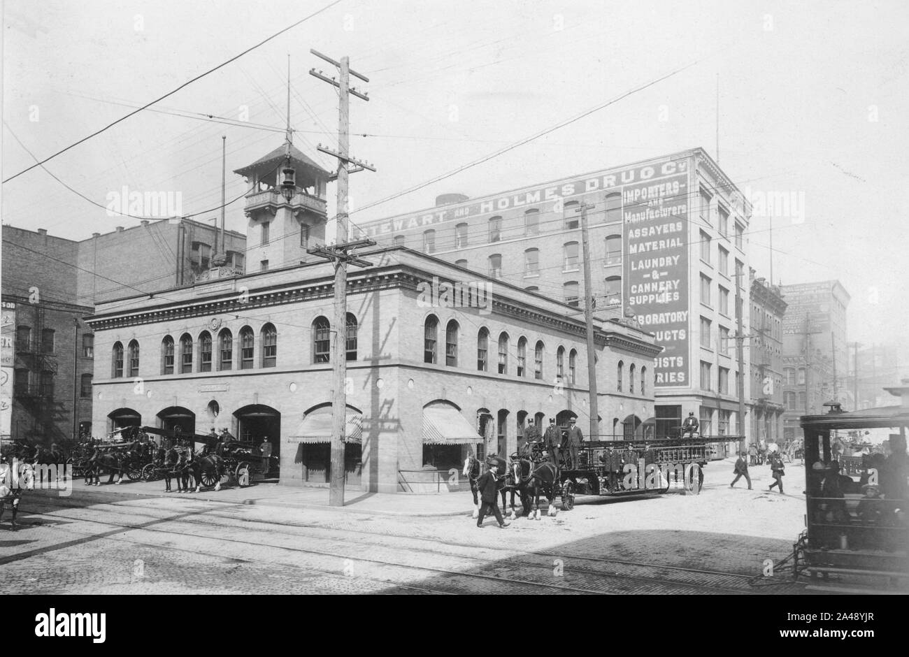 Firehouse No 10 showing horse drawn fire wagons and equipment, Seattle, ca 1905 (WARNER 638). Stock Photo