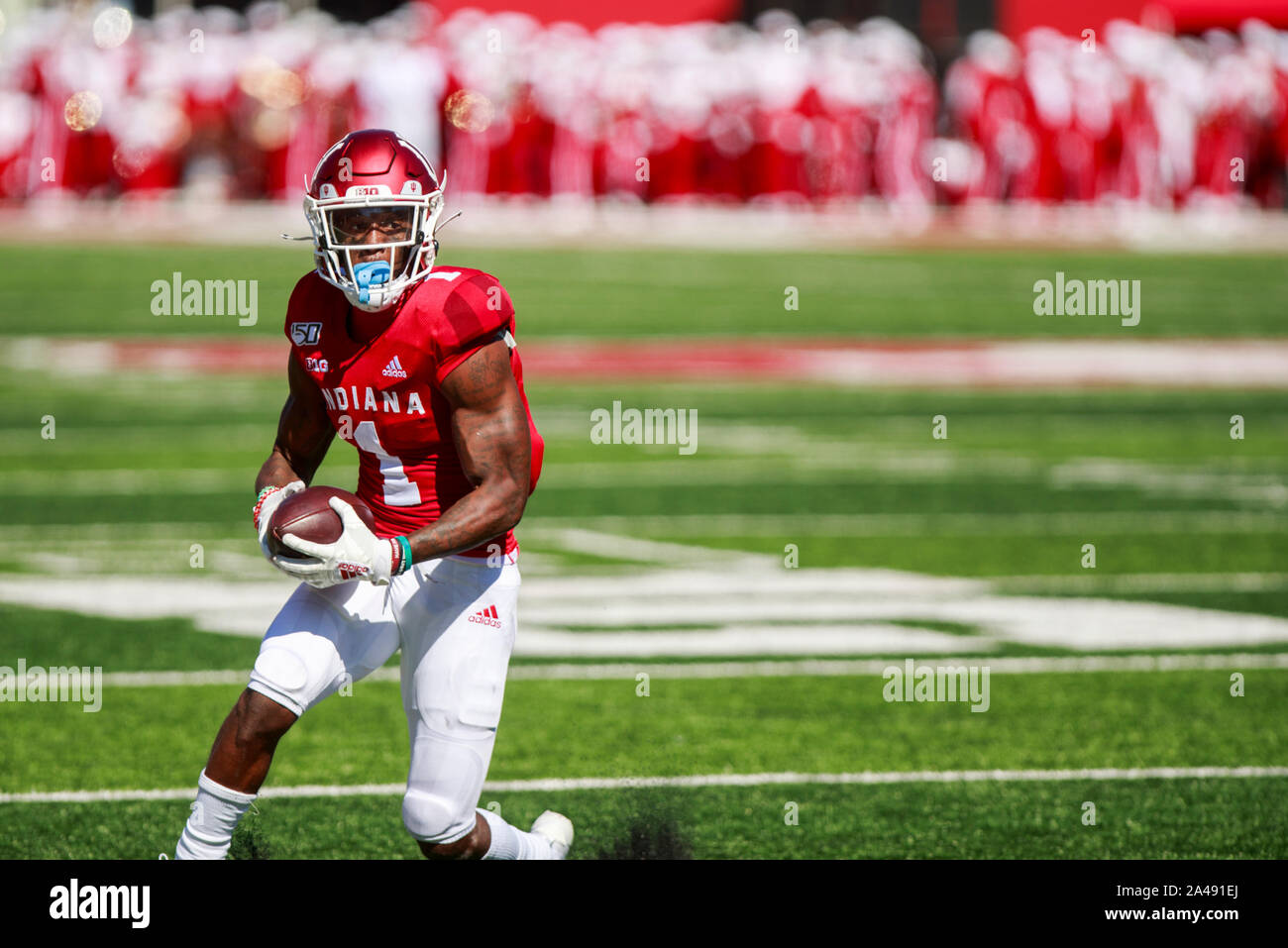 Bloomington, USA. 12th Oct, 2019. Indiana University's Whop Philyor (1) runs with the ball against Rutgers during the NCAA football game at Memorial Stadium in Bloomington.The Indiana Hoosiers beat the Rutgers Scarlet Kings 35-0. Credit: SOPA Images Limited/Alamy Live News Stock Photo