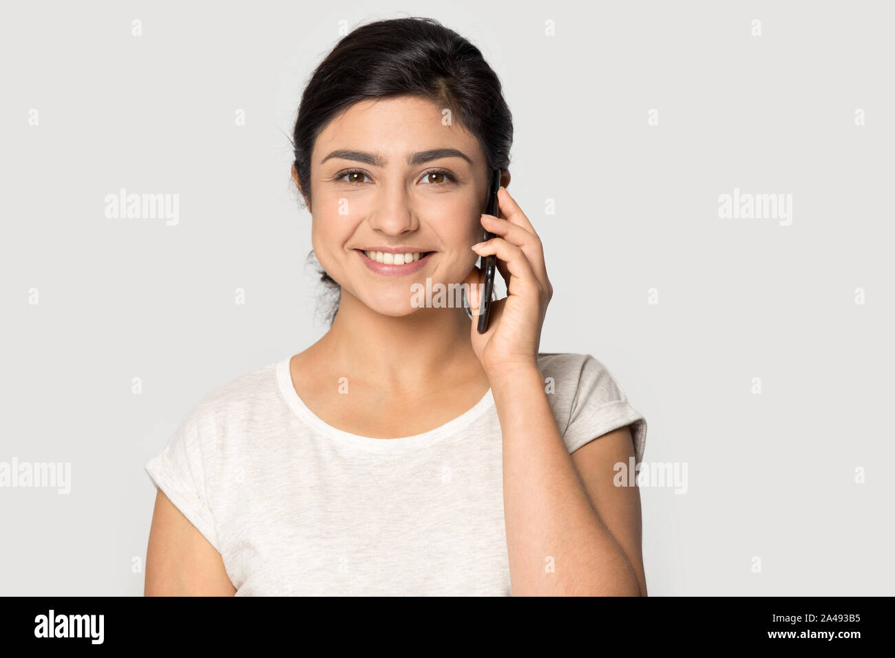 Indian girl smiling at camera hi-res stock photography and images - Alamy
