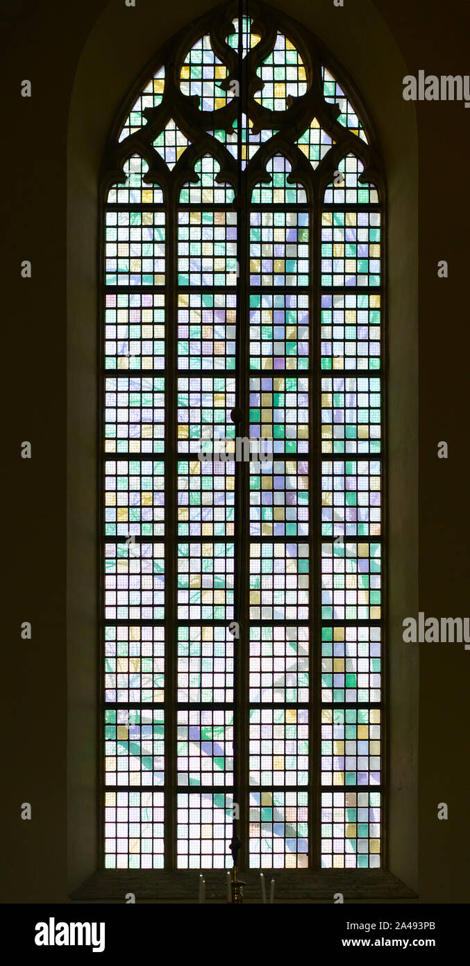 A typical window with colored stained glass in a Protestant church