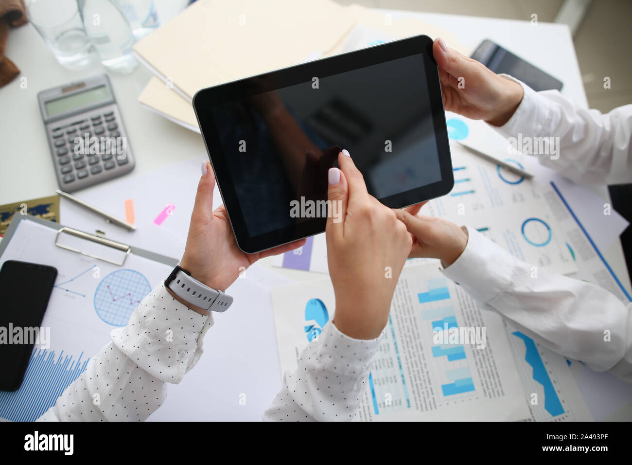 Biz team with modern device Stock Photo