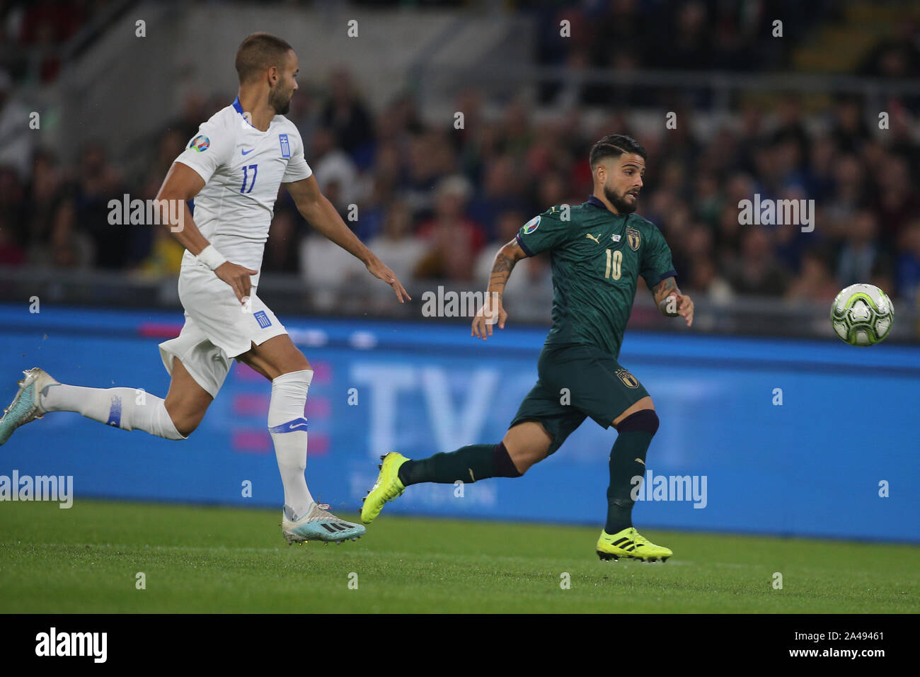 Rome, Italy. 12th Oct, 2019. ROME, ITALY - 12 OCTOBER 2019:P.Hatzidiakos (GREECE), L.Insigne (ITALY) in action during the UEFA Euro 2020 qualifier match between Italy and Greece, group j on October 12, 2019 in Rome, Italy. Credit: Independent Photo Agency/Alamy Live News Stock Photo