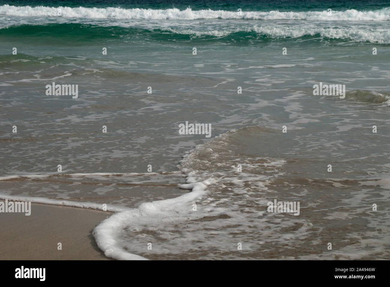 Kangaroo Island Australia, water's edge with waves breaking at Stokes Bay Stock Photo