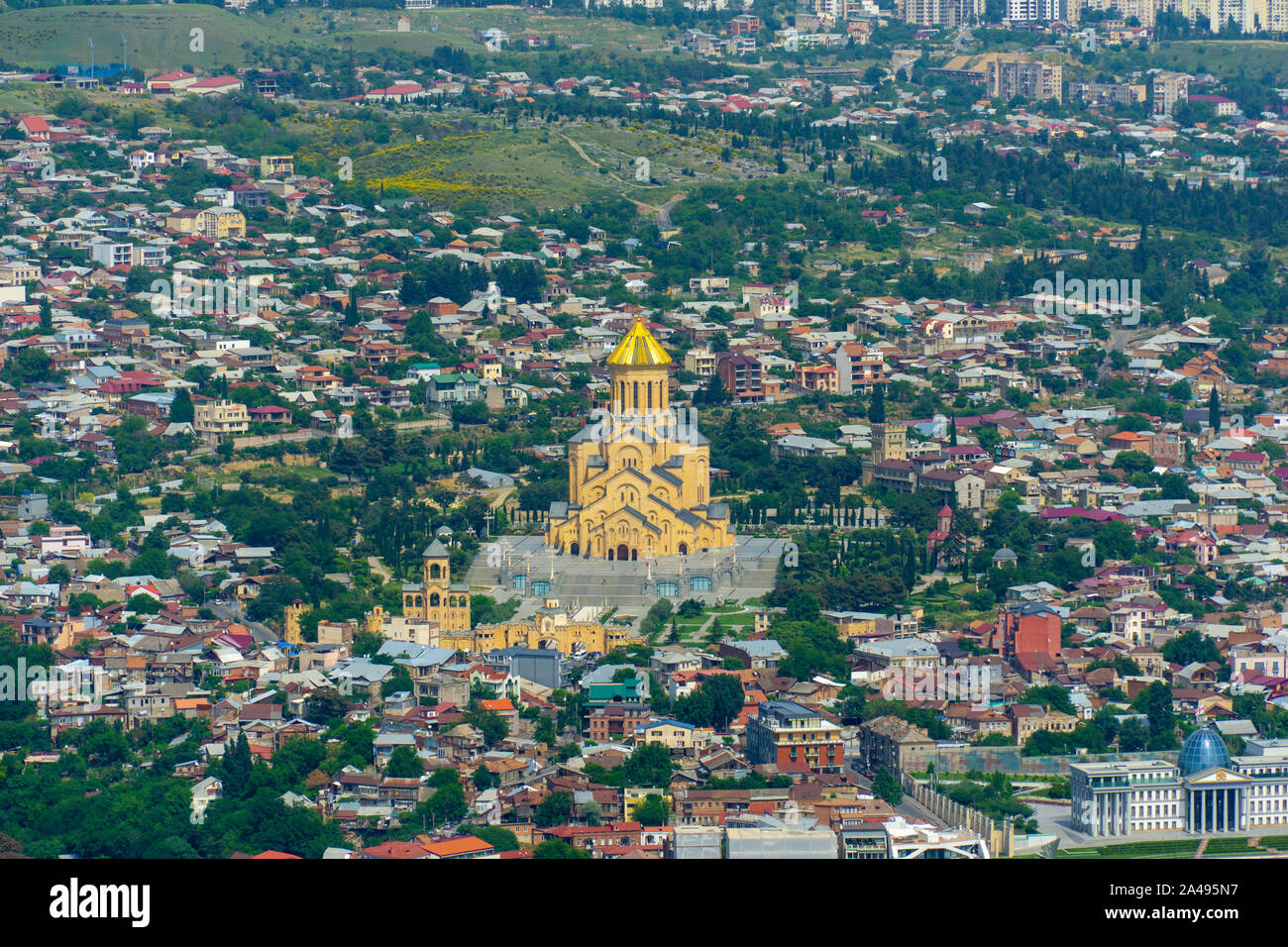 View of the Holy Trinity Cathedral Tsminda Sameba from uphill in ...