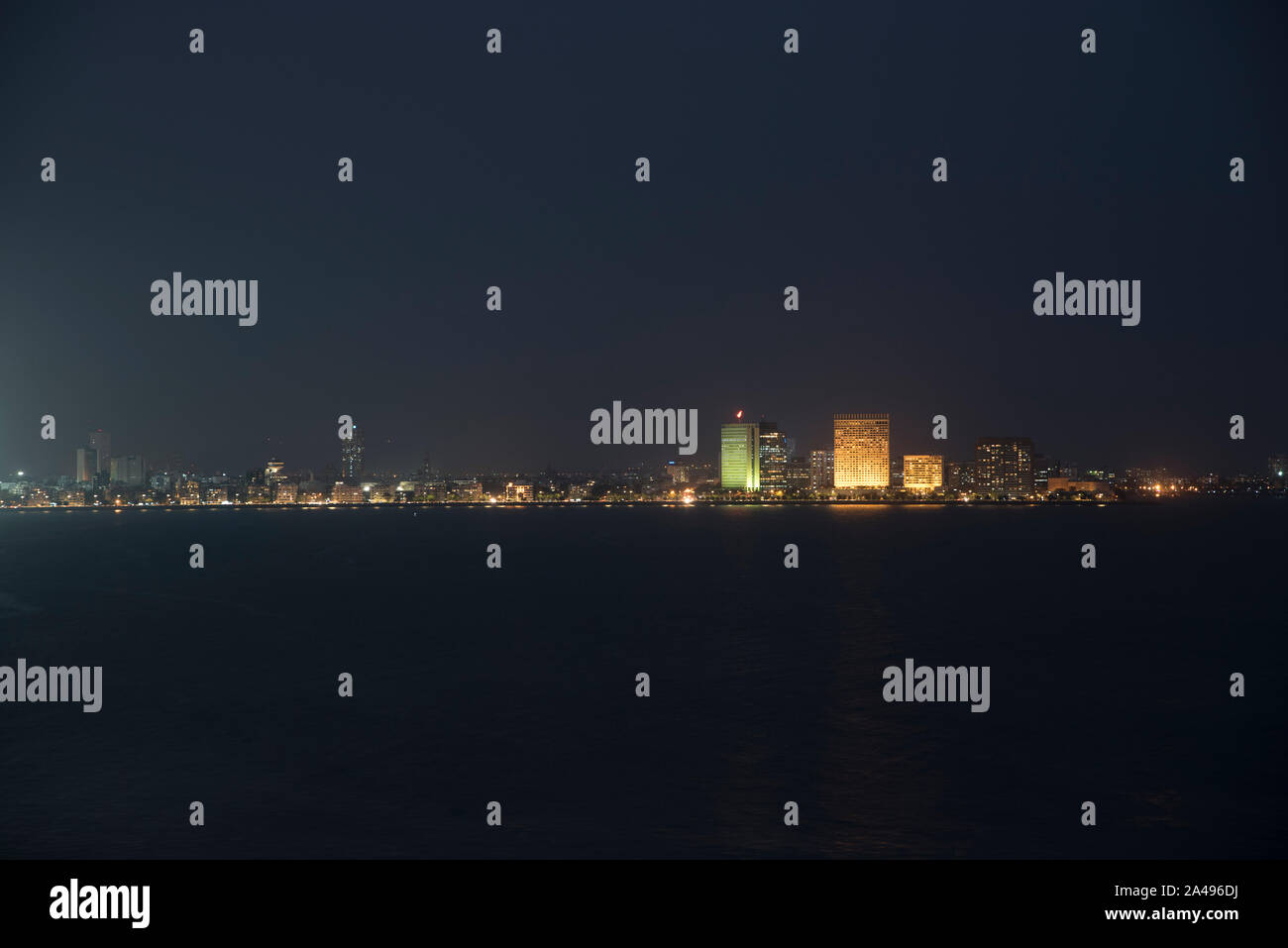 A night view of marine drive, Nariman point and Cuffe Parade from across the bay at Malabar hill in Mumbai, India. Stock Photo