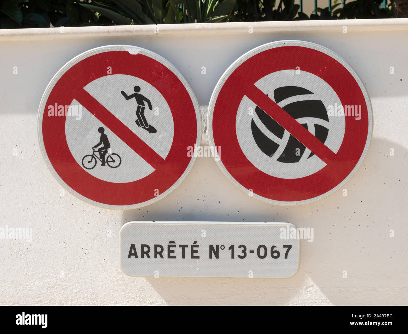 Signs prohibiting ball games, skateboarding and cycling, France, Europe Stock Photo