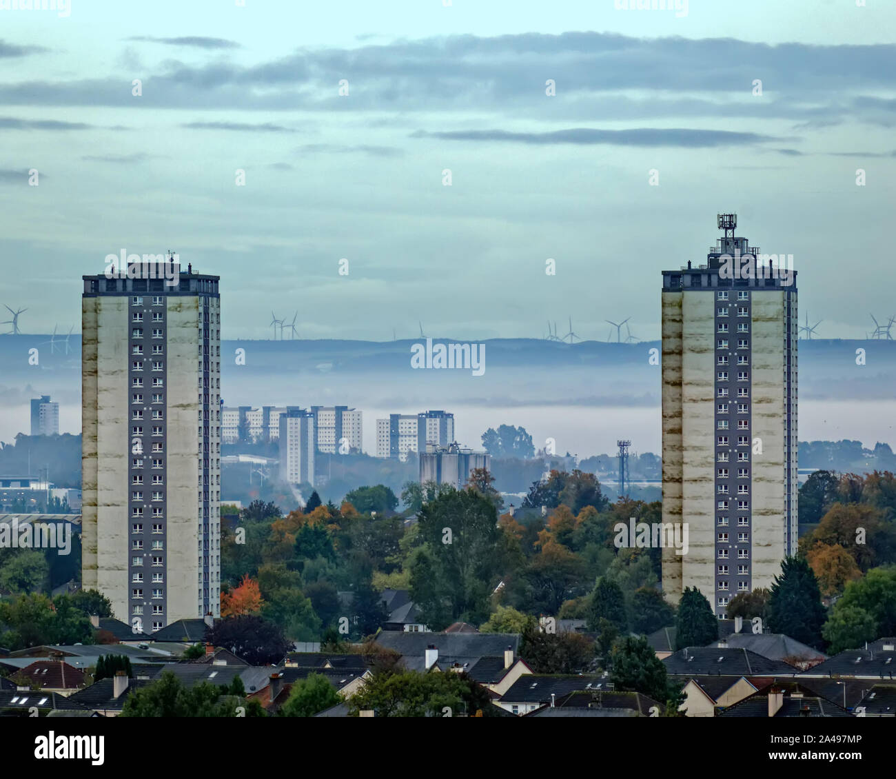 Glasgow, Scotland, UK 13th October, 2019. UK Weather: Morning freezing fog greeted Glaswegians as cold temperatures overnight saw localised mist over parts of the south of the cit with the towers od scotstoun to the fore. Gerard Ferry/ Alamy Live News Stock Photo