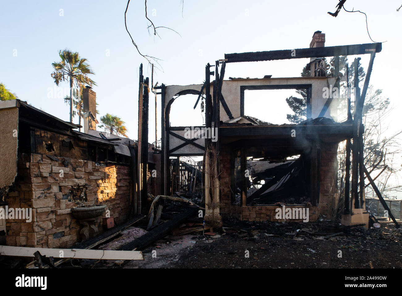 Los Angeles, USA. 12th Oct, 2019. A burnt house is seen following a ...
