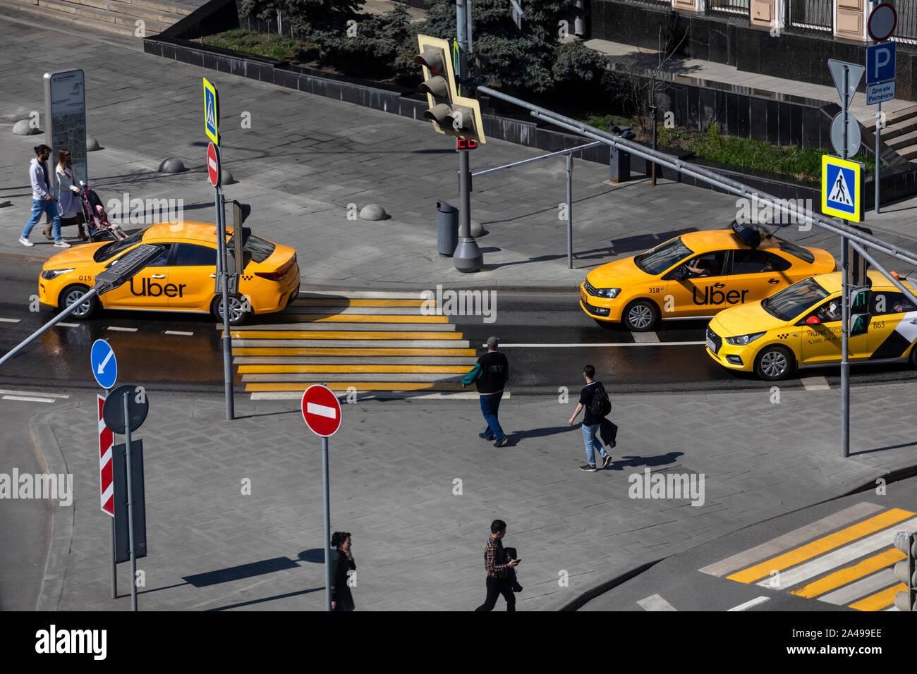 Aerial view of taxi companies Uber and Yandex cars in the center of