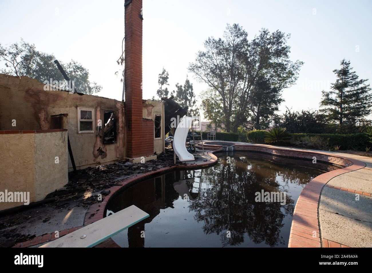 Los Angeles, USA. 12th Oct, 2019. Burnt houses are seen following a ...