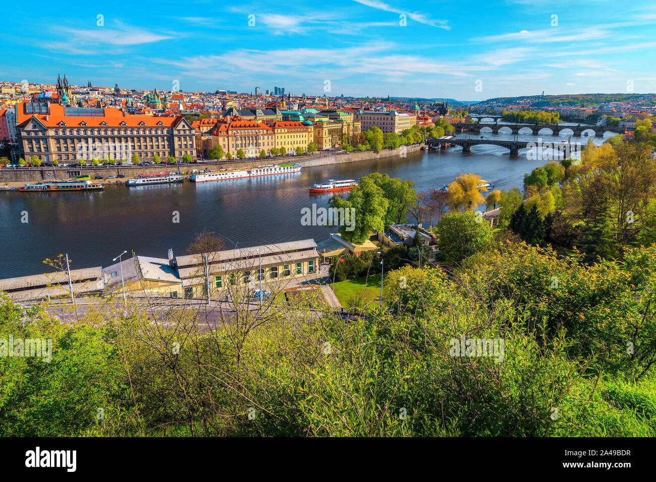 Popular European touristic city view from the best visited excursion place. Picturesque panorama with Vltava river and famous old bridges, Prague, Cze Stock Photo