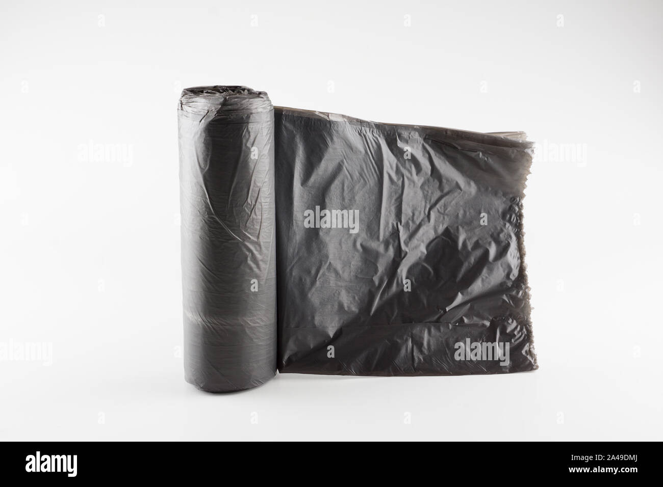 big roll of trash bags isolated on white background Stock Photo Alamy