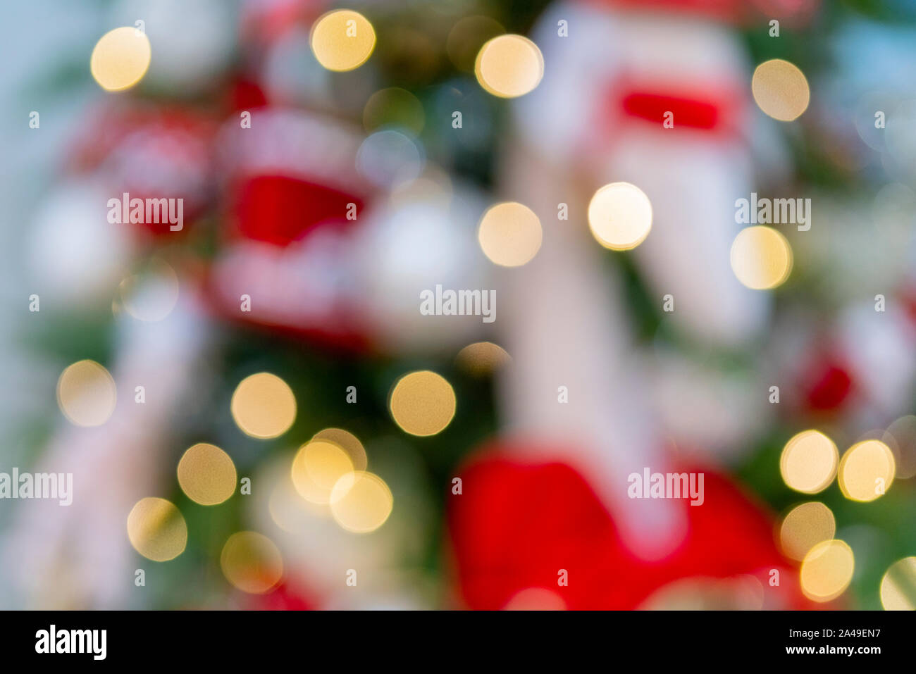 Yellow christmas tree lights. Defocus. Background for design Stock