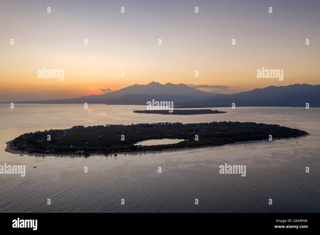 Gili Meno and Gili Air Islands photographed by drone from Gili Trawangan, Indonesia Stock Photo