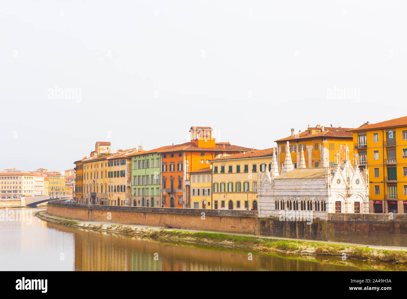 Pisa, view of the Arno river that passes in the city center and the church of Santa Maria della Spina. Stock Photo