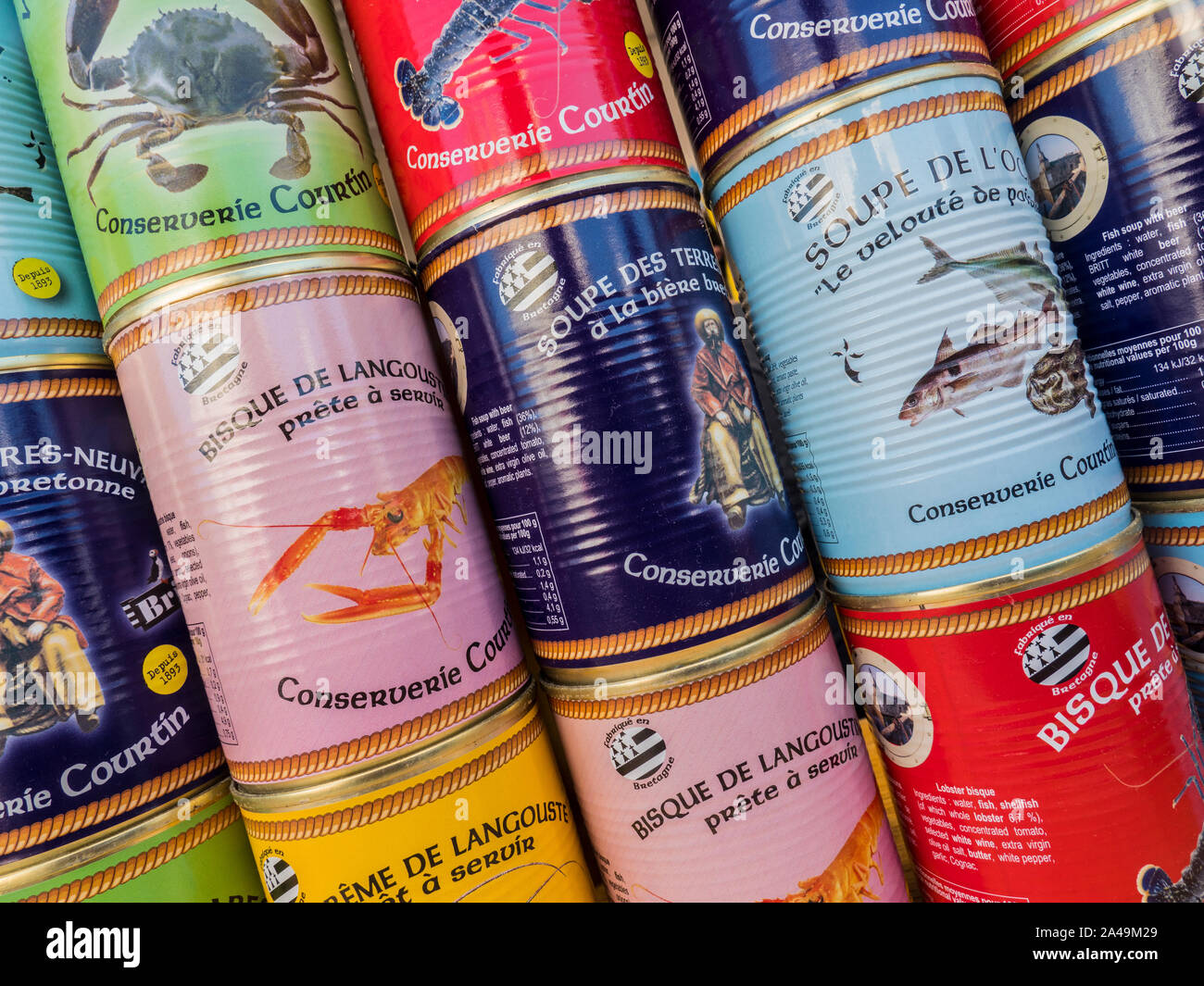 FISH SOUP CANS local canned speciality lobster bisque French Brittany soups on display for sale at Pont-Aven Brittany France Stock Photo
