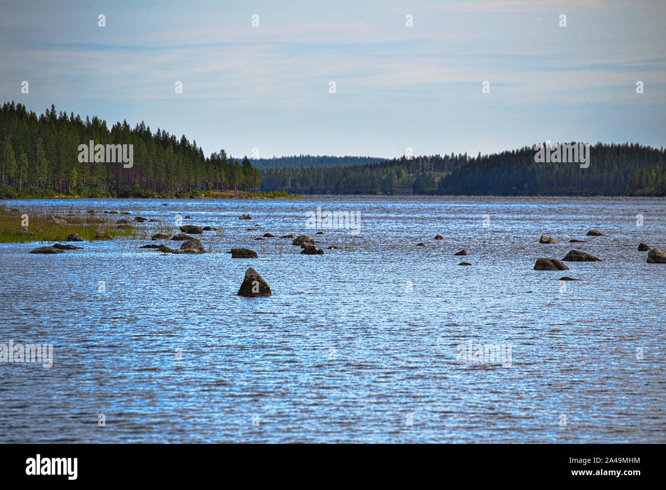 Rocks in shallow water hi-res stock photography and images - Alamy