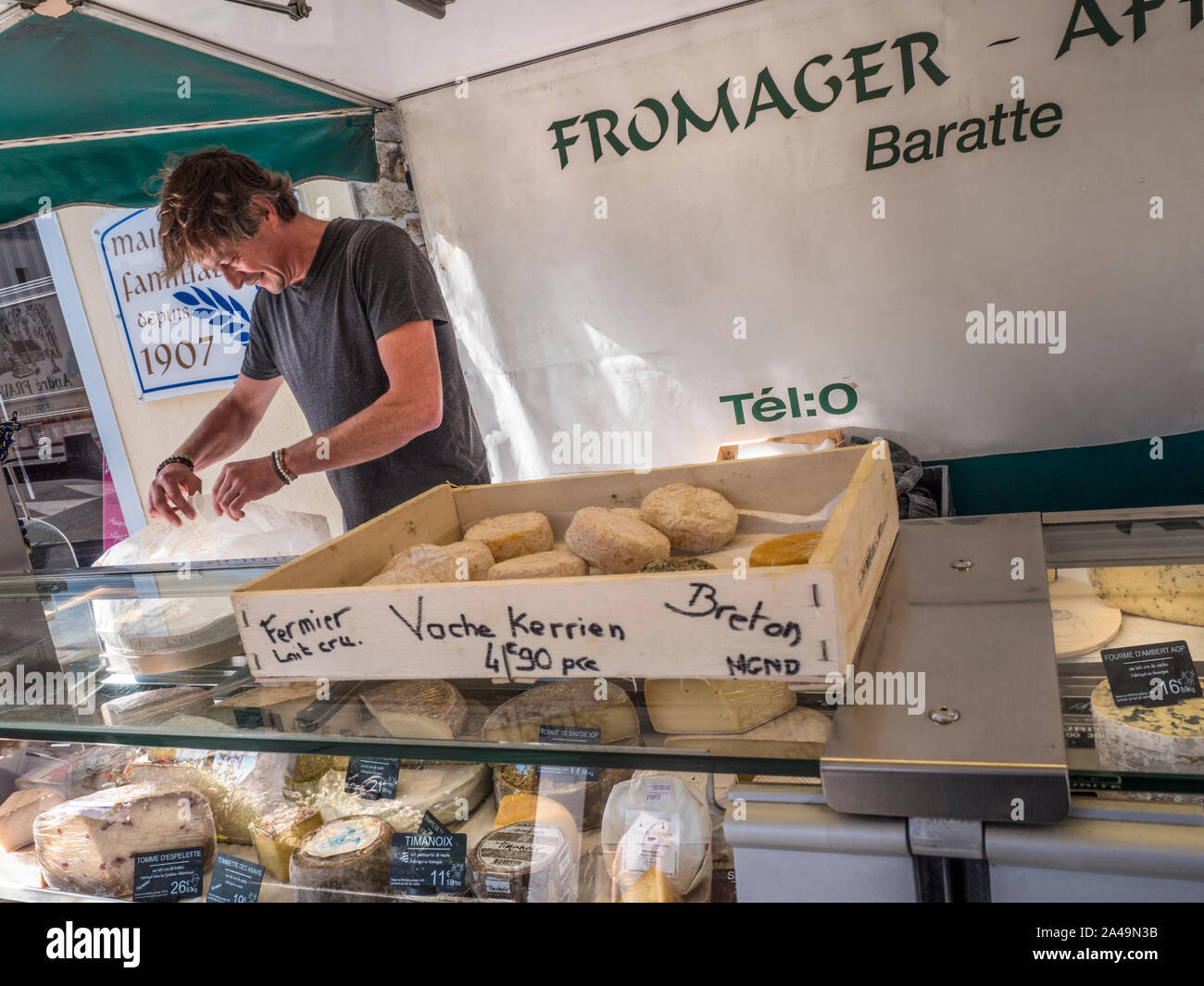 Breton Cheese market stall Brittany Street Market Fromager cheese maker