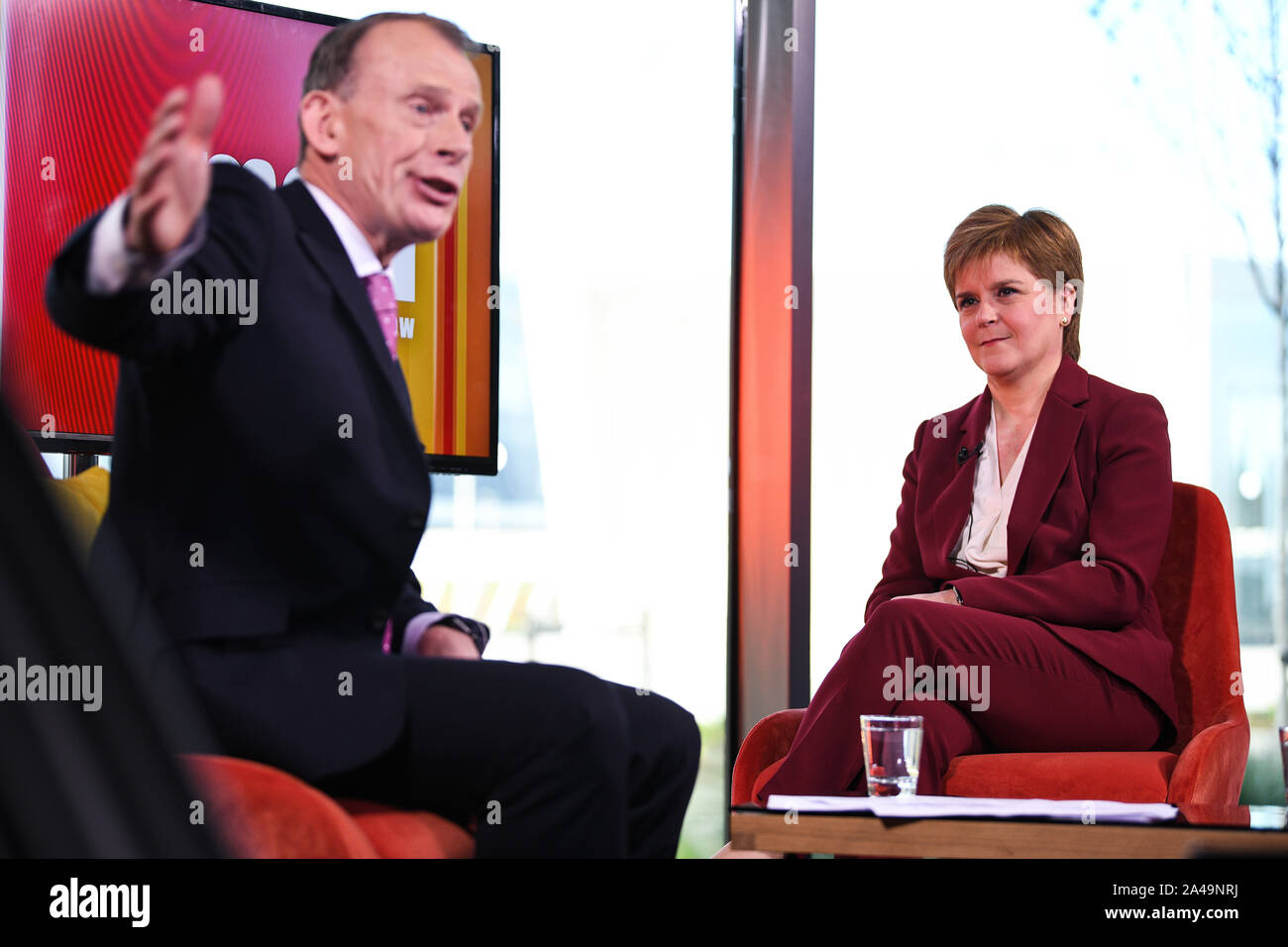 Presenter Andrew Marr and First Minister of Scotland Nicola Sturgeon, during the Andrew Marr show. Nicola Sturgeon has told Jeremy Corbyn 'don't even bother picking up the phone' to ask the SNP to support a Labour government unless he backs an independence vote. PA Photo. Picture date: Sunday October 13, 2019. Scotland's First Minister was asked if she would consider a coalition with Labour in the event of a general election that saw it emerge as the largest party, but without an overall majority. The SNP leader said she would favour a 'progressive type of alliance' if the Tories were ousted f Stock Photo