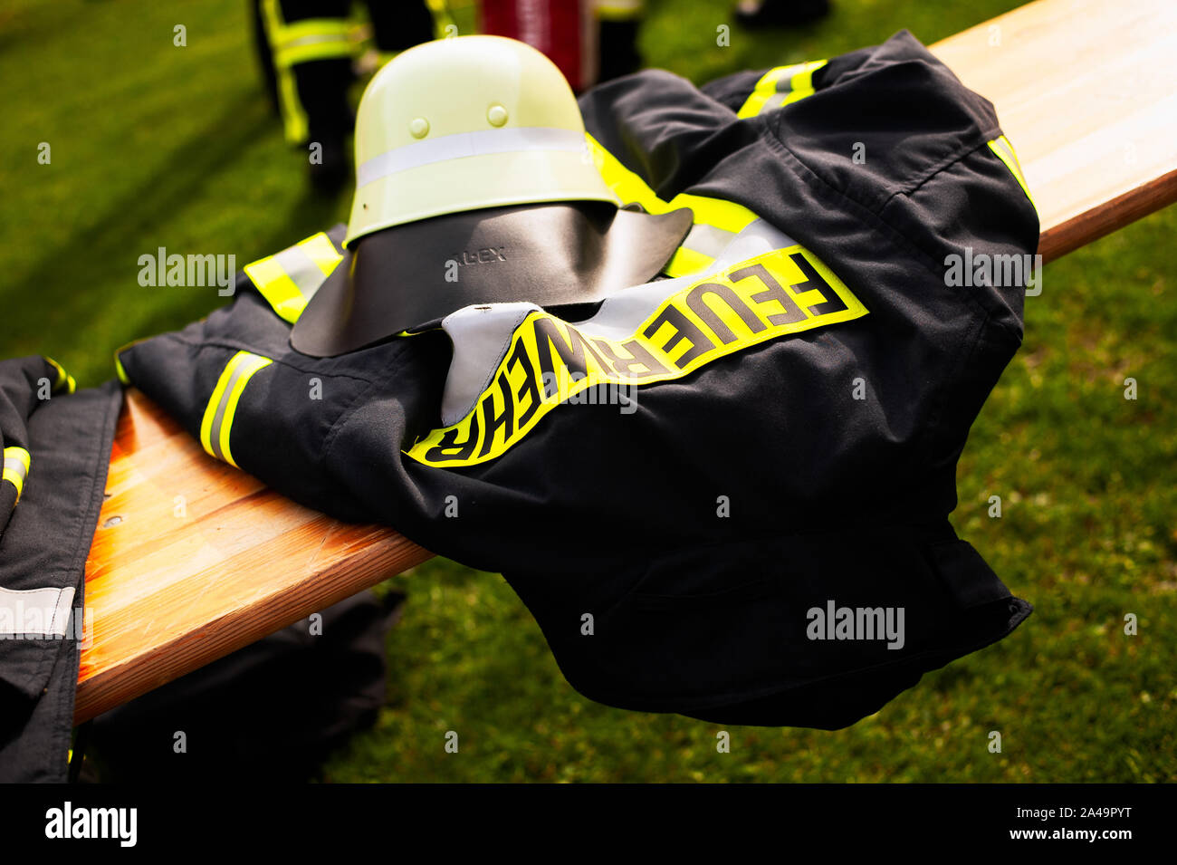 Germany, Niederstetten. September 2019. Firefighters uniform with text Feuerwehr, in inglish fireman. Stock Photo