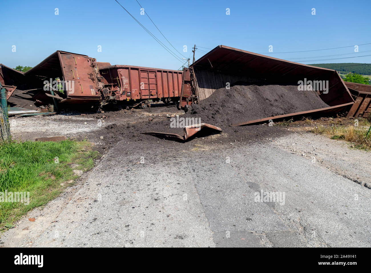 Train crash accident, road block. Mechanical problems and track conditions are to blame for a train derailment. Abstract: Transportation Safety Stock Photo