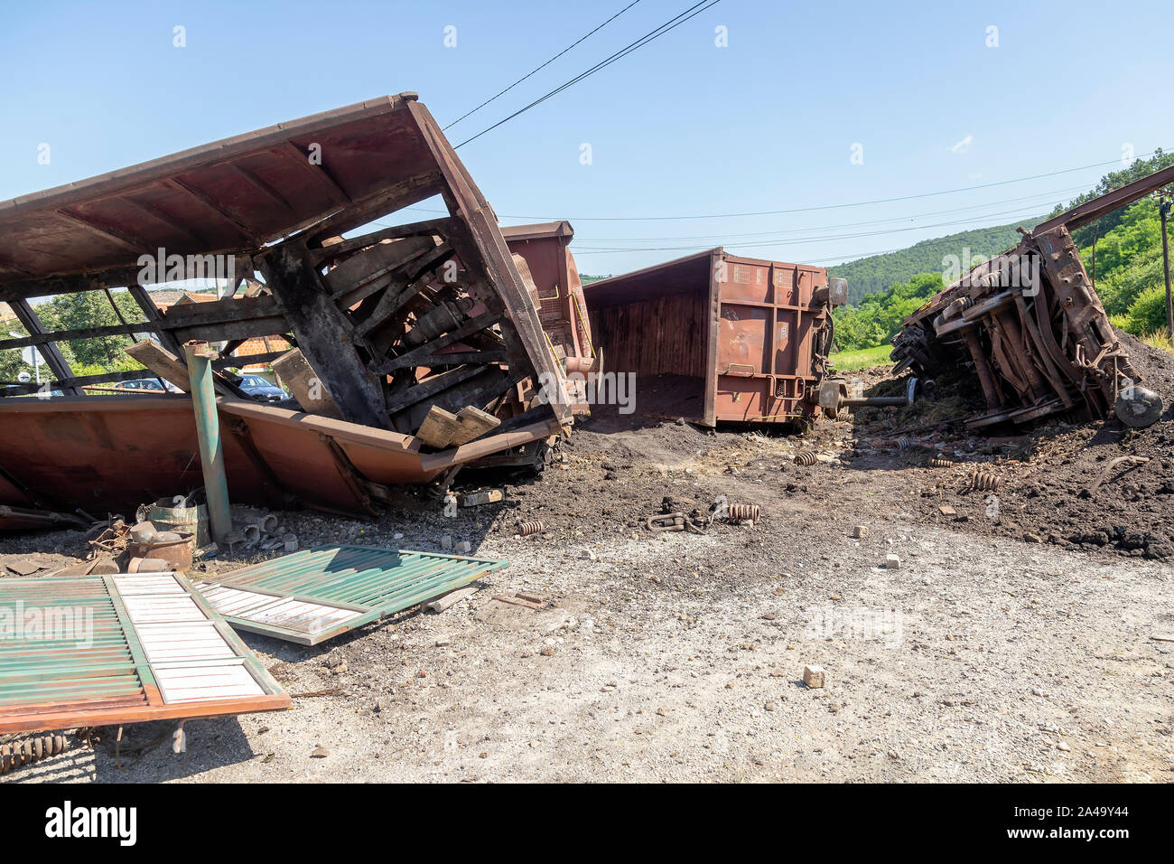 Train crash accident. Cargo damaged in freight train derailment. Mechanical problems and track conditions are to blame for a train derailment. Abstrac Stock Photo