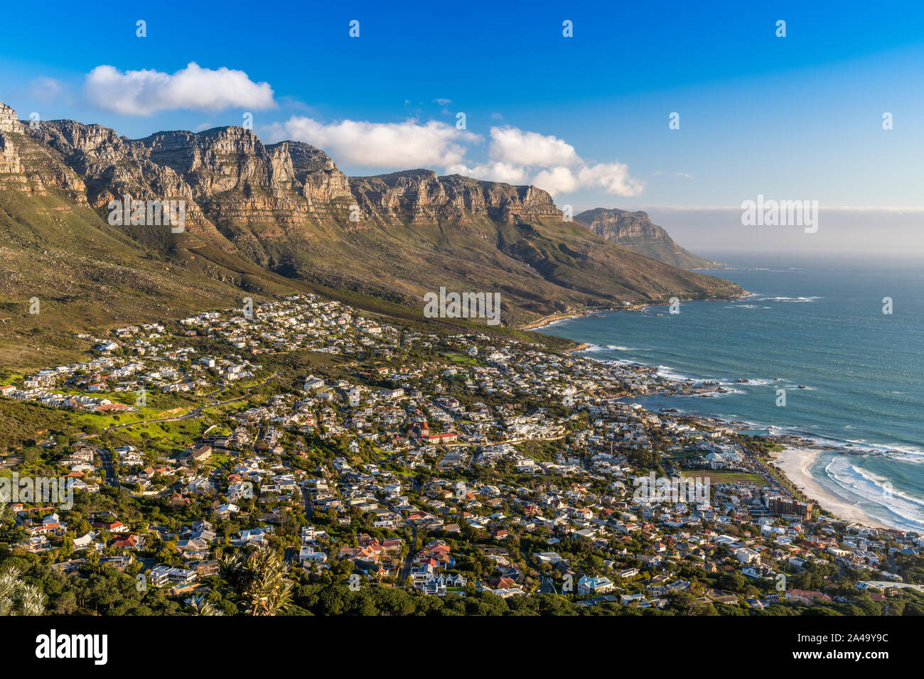 Camps Bay with Twelve Apostles Mountains in the foreground, Cape Town, Western Cape, South Africa Stock Photo