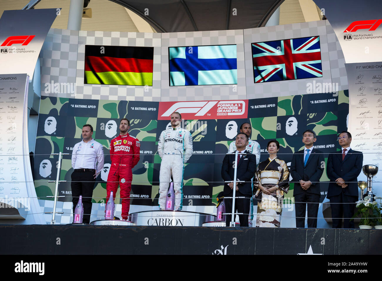 Suzuka Circuit, Suzuka City, Japan. 13th Oct, 2019. Formula One Japanese Grand Prix, Race Day; Sebastian Vettel, Valtteri Bottas and Lewis Hamilton on the podium after the race - Editorial Use Credit: