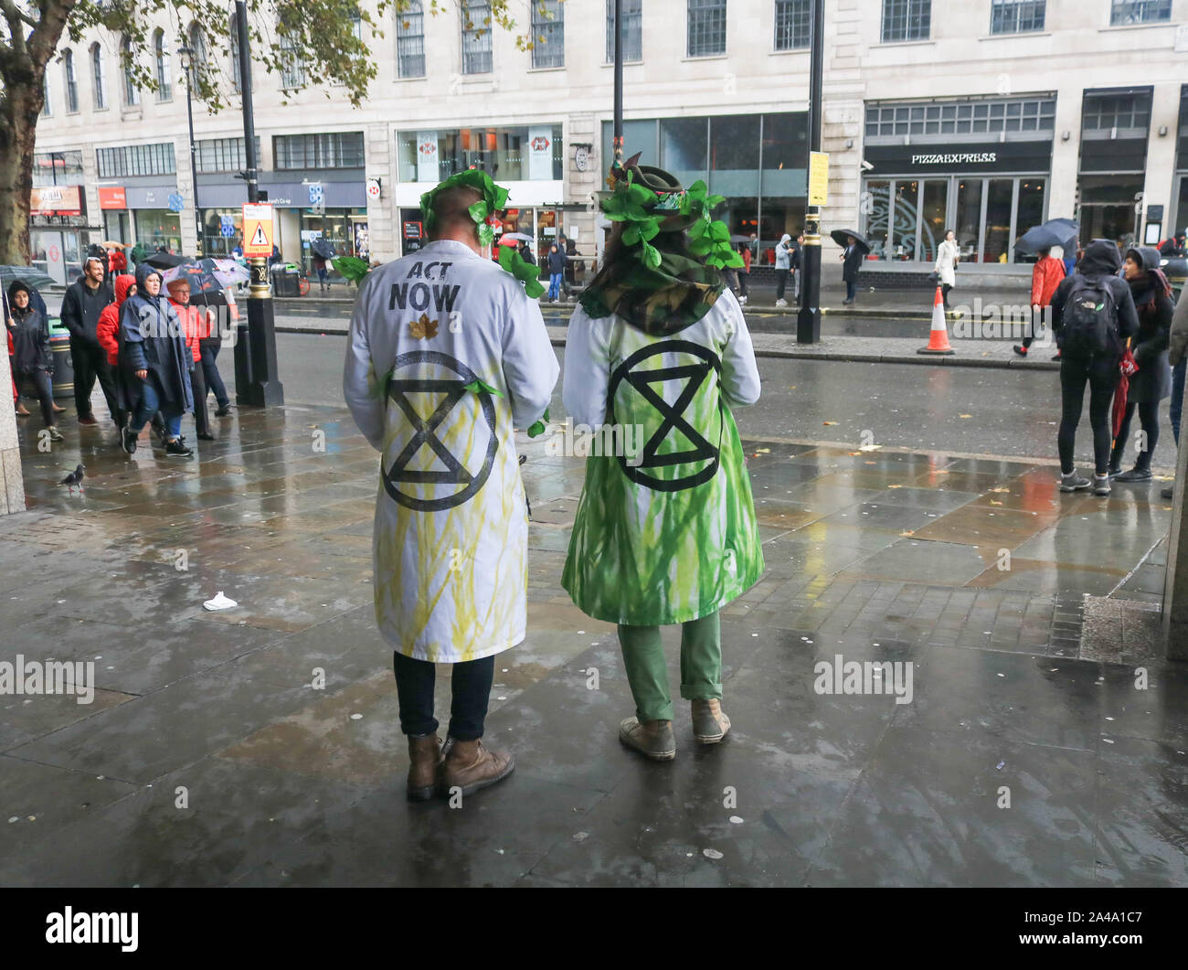 London, UK - 13 October 2019. Climate activists from Extinction Rebellion continue their protest  in Trafalgar Square in an attempt to force the government to declare a climate emergency and meet their demands to reduce to zero carbon emmissions by 2025. Credit: amer ghazzal/Alamy Live News Stock Photo