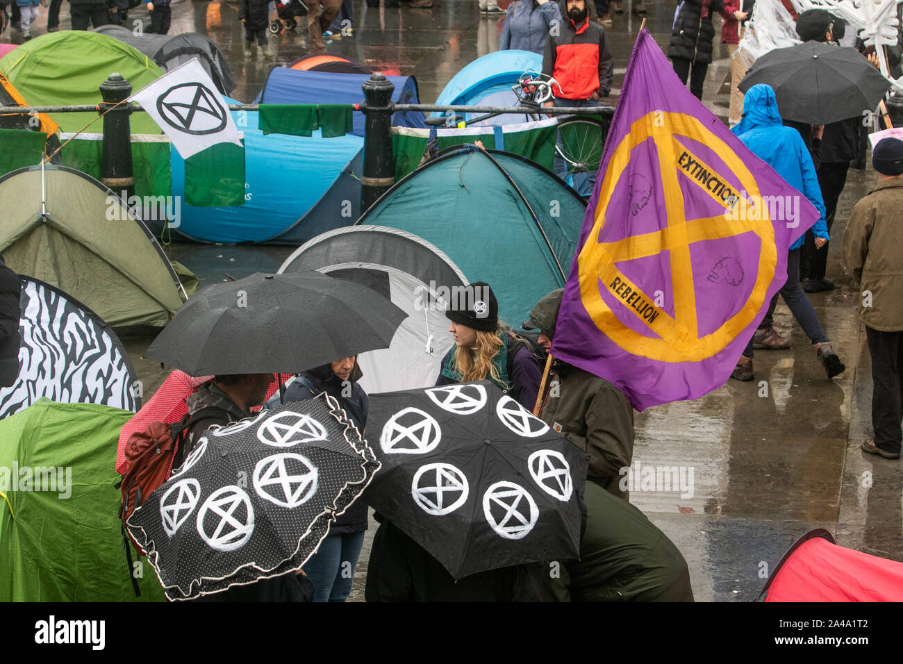 London, UK - 13 October 2019. Climate activists from Extinction Rebellion continue their protest for a seventh day  as they set up camp  in bivouacs in Trafalgar Square in an attempt to force the government to declare a climate emergency and meet their demands to reduce to zero carbon emmissions by 2025. Credit: amer ghazzal/Alamy Live News Stock Photo
