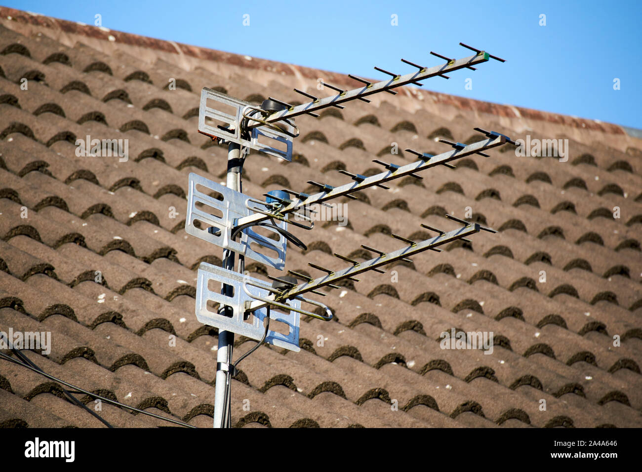 three television aerials on a pole outside a house in Liverpool England UK Stock Photo