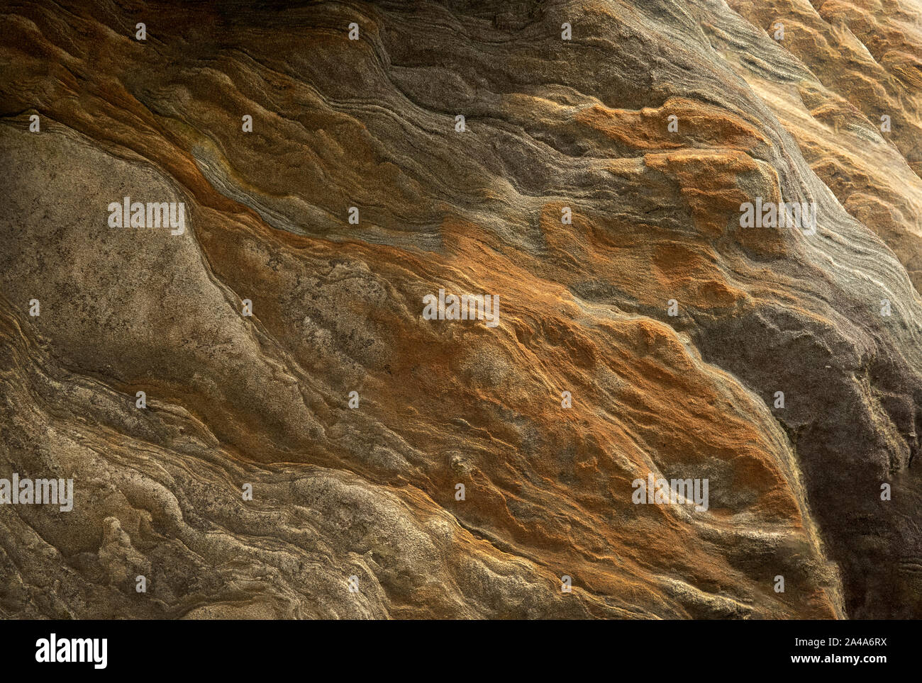 Sedimentary sandstone textured and coloured background Stock Photo