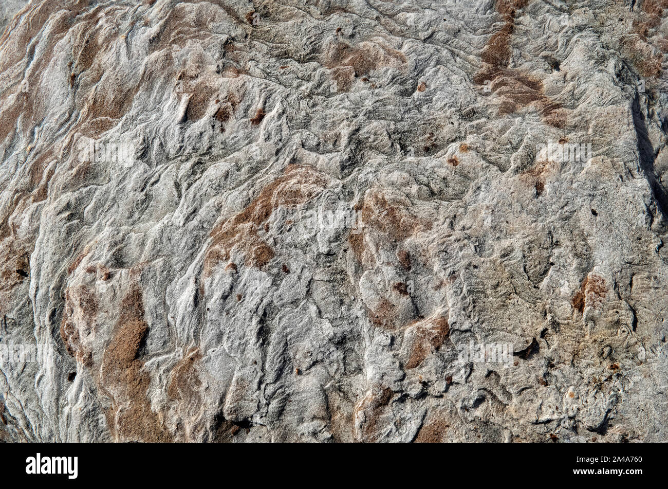 Sedimentary sandstone textured and coloured background Stock Photo
