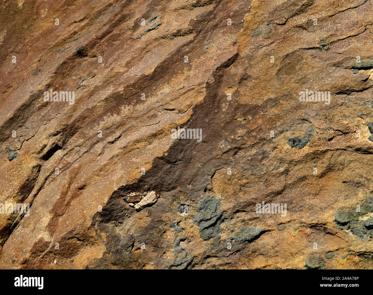 Sedimentary sandstone textured and coloured background Stock Photo