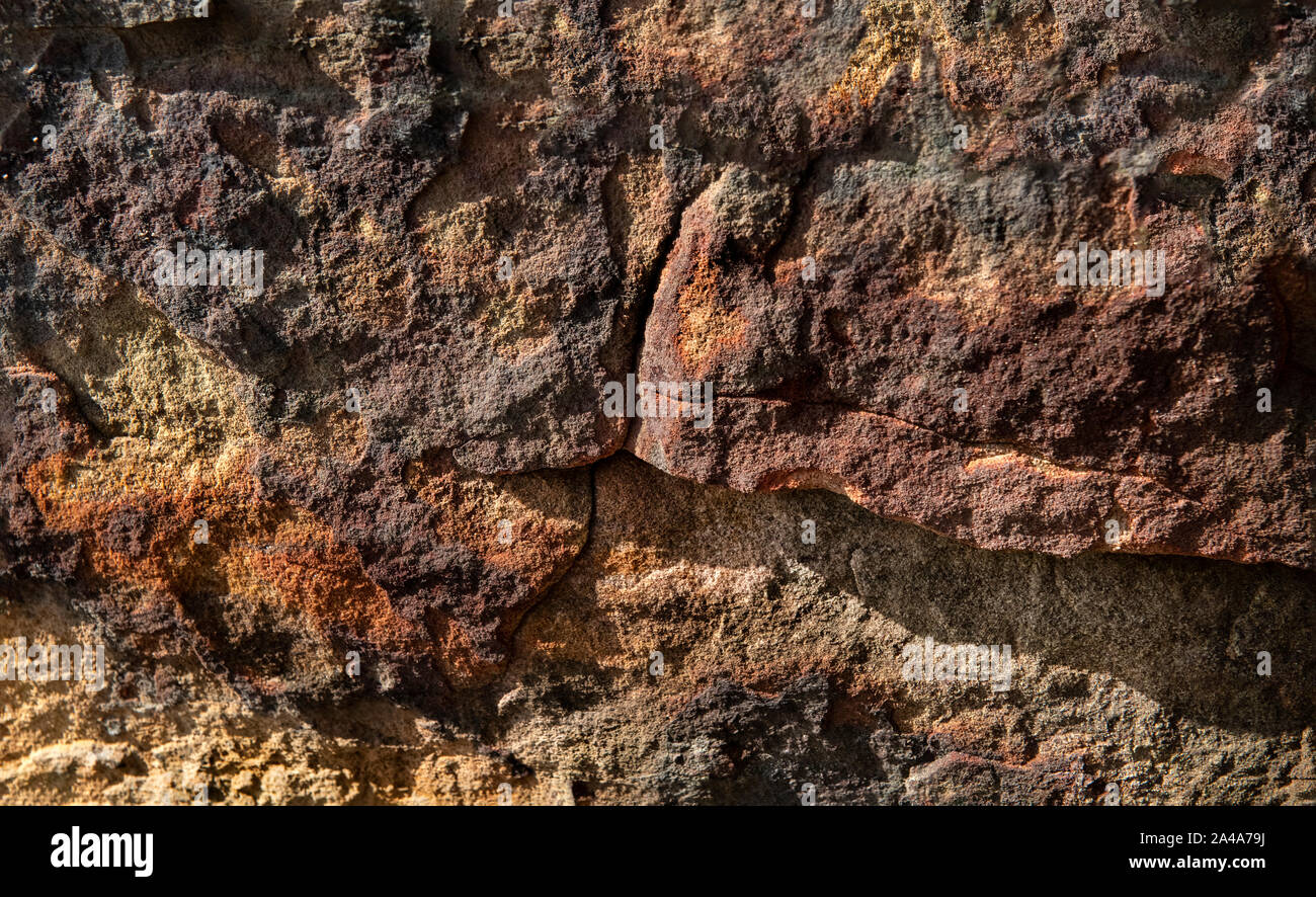Sedimentary sandstone textured and coloured background Stock Photo