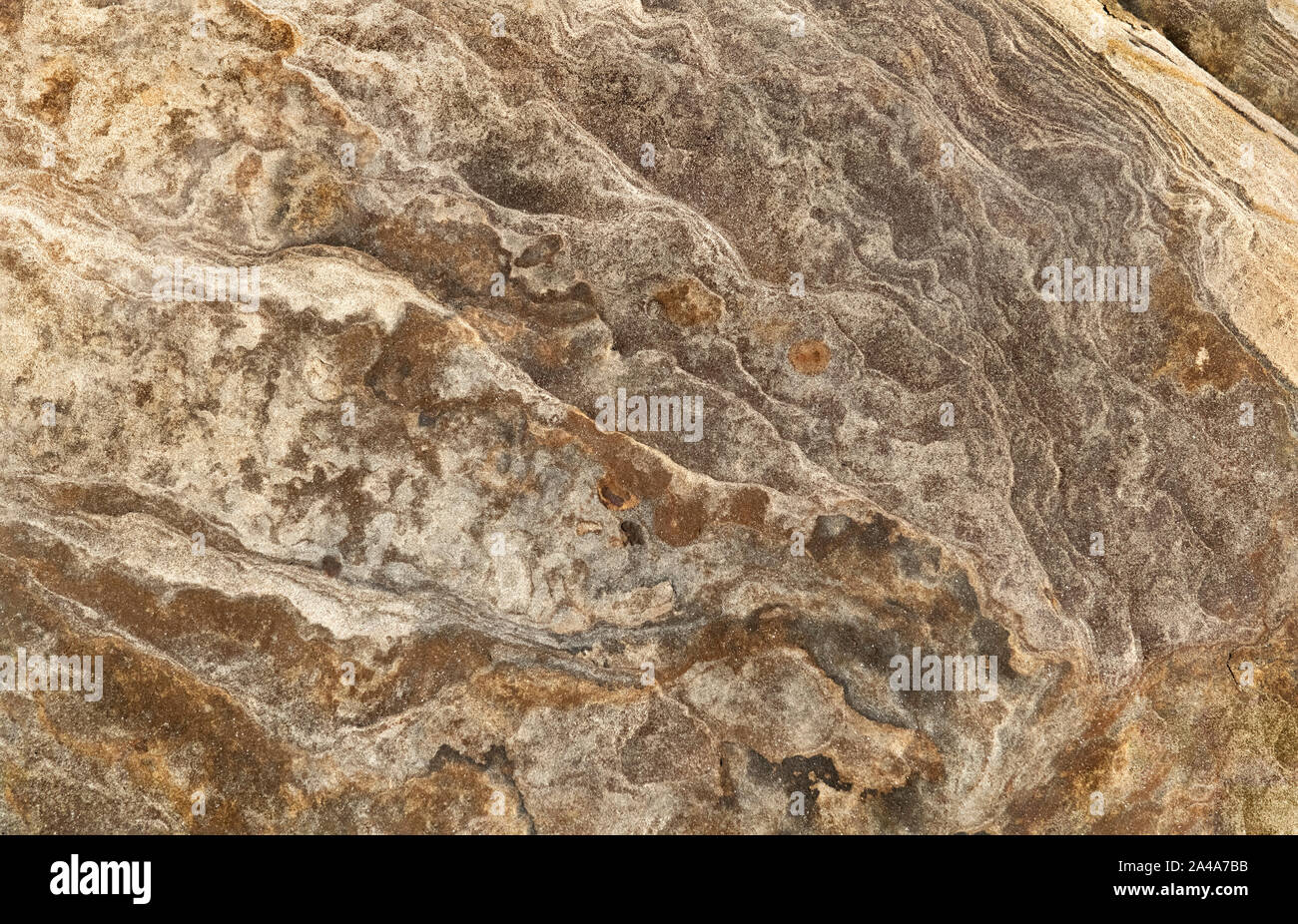 Sedimentary sandstone textured and coloured background Stock Photo