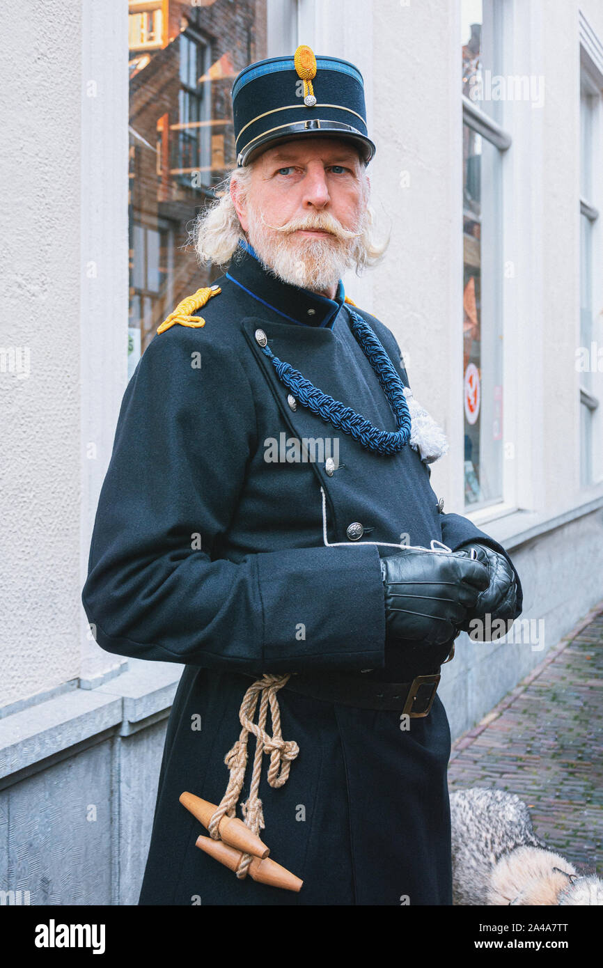 Deventer, Netherlands - December 15, 2018: Policeman one of the characters from the famous books of Dickens during the Dickens Festival in Deventer Stock Photo