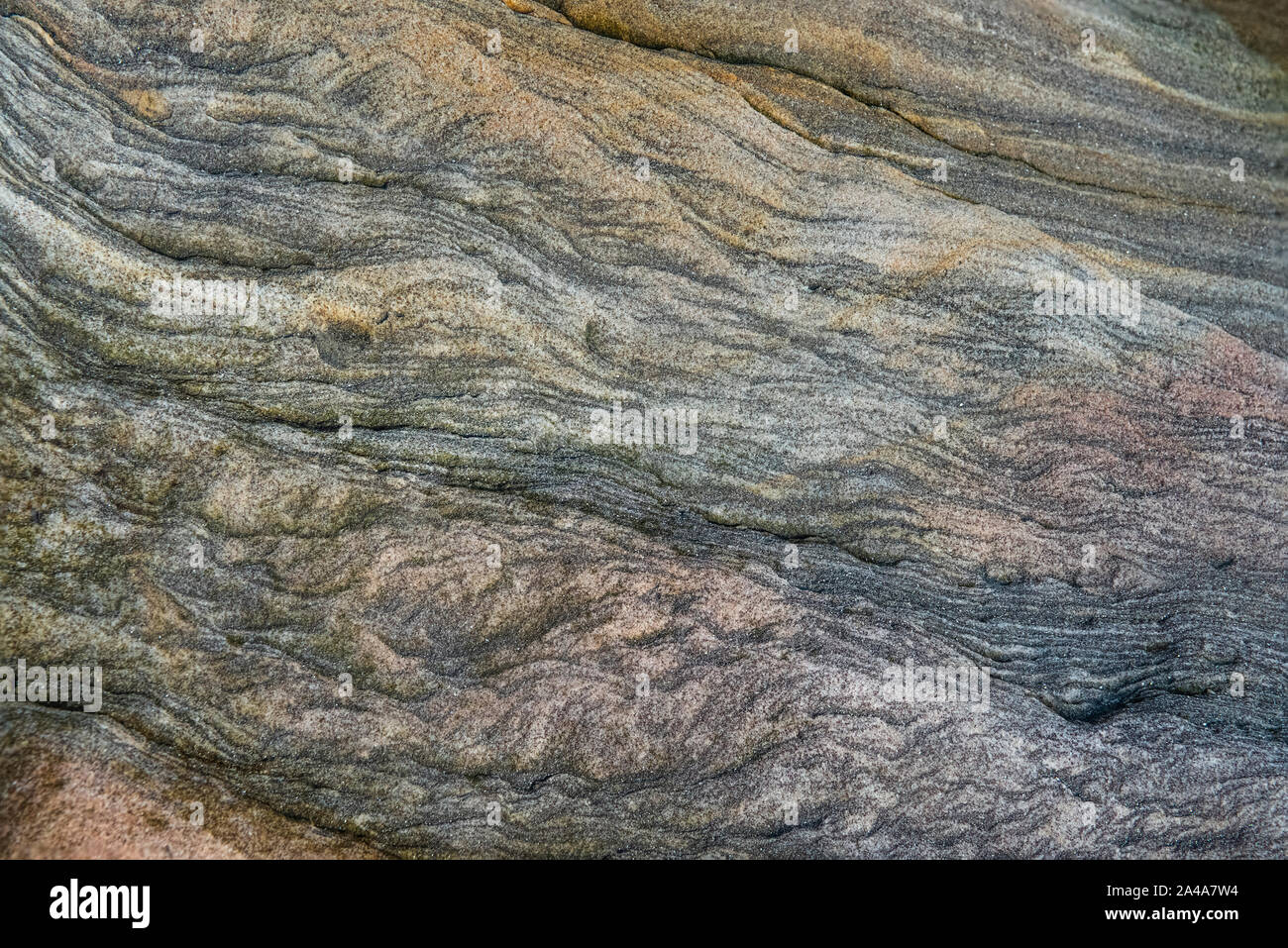 Sedimentary sandstone textured and coloured background Stock Photo