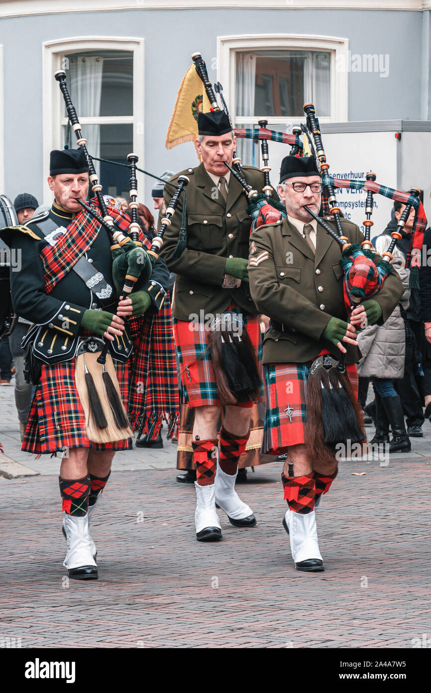 Deventer, Netherlands, December 15, 2018: Three bagpipe players during the Dickens Festival in Deventer Stock Photo