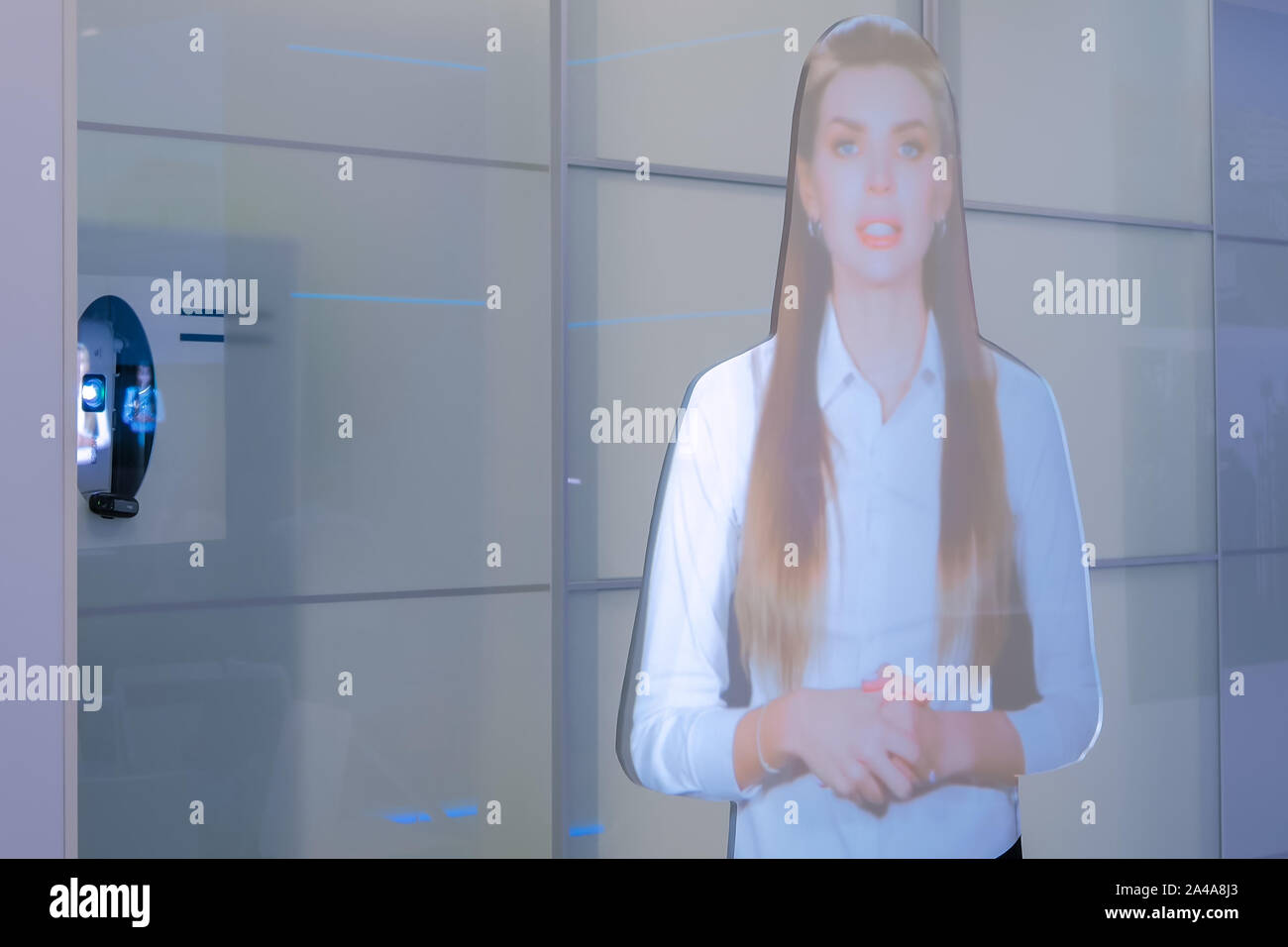 Interactive virtual promoter hologram mannequin: advanced digital display Stock Photo