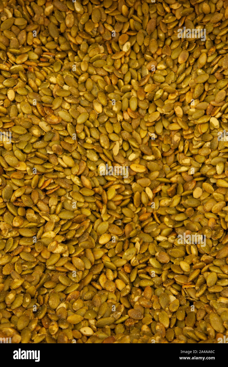 Roasted salty pumpkin seeds hi-res stock photography and images - Alamy